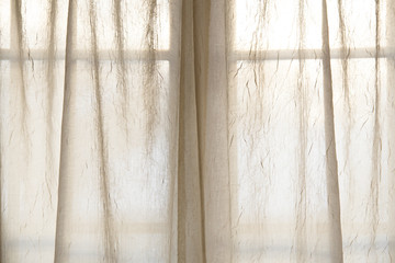 Sheer fabric window curtain with filtered light