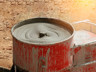 Cement or mortar is inside cement mixer in construction site