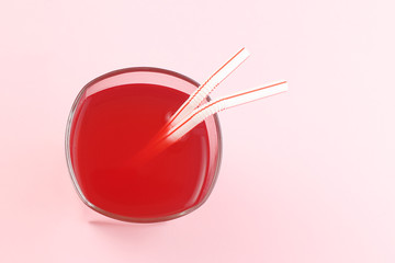 Red Drink with Two Plastic Straws