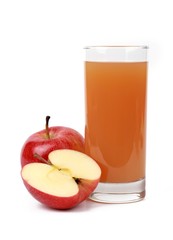 apple juice - sliced ​red apples and a glass of naturally cloudy apple juice in front of white background