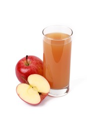 apple juice - sliced ​red apples and a glass of naturally cloudy apple juice in front of white background