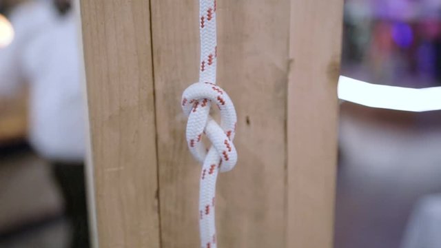 Marine knot on a wooden background