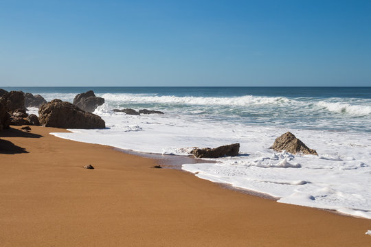Rocks on the sandy beach, Lalla Fatna, Morocco