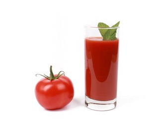 fresh tomato juice - glass with fresh tomato juice and a fresh tomato isolated on white