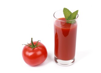 fresh tomato juice - glass with fresh tomato juice and a fresh tomato isolated on white