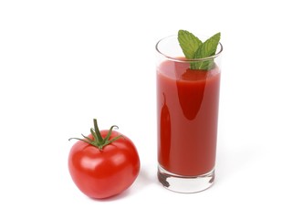 fresh tomato juice - glass with fresh tomato juice and a fresh tomato isolated on white