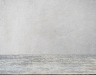 Wall of wooden table in front of abstract blurred background