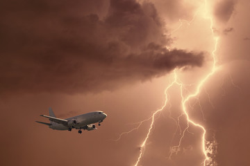 Fototapeta premium Passenger airplane landing in the stormy weather on the backdrop lightning