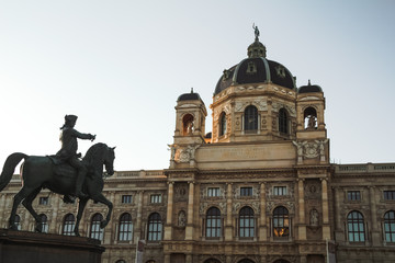 Fototapeta na wymiar Exterior of Naturhistorisches Museum of Nature and History at Maria Theresa square (Maria-Theresien-Platz) and monument of Empress at sunset in Vienna, Austria