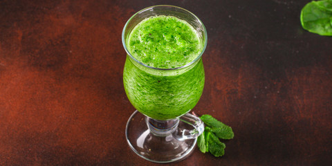 green smoothies (greens, spinach, celery, and more) superfood. Food background