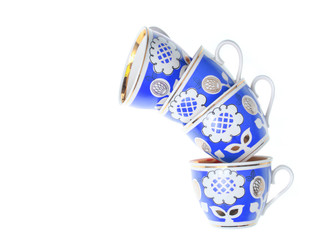 Set of retro ceramic cups with patterns isolated on white background.