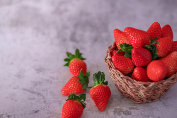 Strawberries on dark background. Place to text.