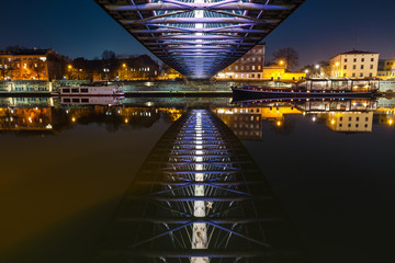 Bernatka footbridge over Vistula river at night, Krakow, Poland