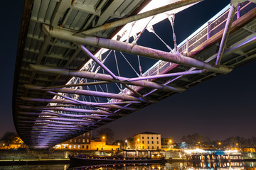 Bernatka footbridge over Vistula river at night, Krakow, Poland