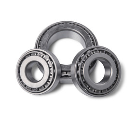 Three tapered roller bearings isoleted on white background. Top view.