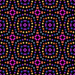 Seamless abstract pattern background with a variety of colored circles.