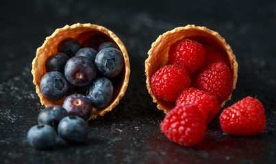 Fresh Blueberries, Raspberries, strawberries in waffle cones.
