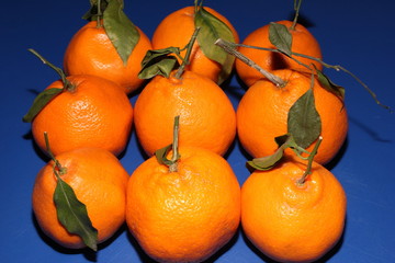 Fresh Mineola tangerines with leaves. The concept of healthy eating, citrus and vitamin C