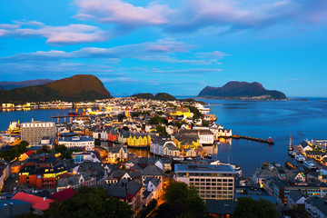 Aerial view of Alesund, Norway at sunset. Blue night sky