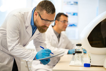 Two mature scientists collaborating for research