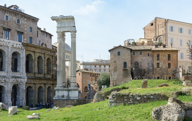 Fototapeta premium The base of the temple is Bellona, the ancient Roman goddess of war. Near three columns and the church of San Nicola in Carcher. Rome