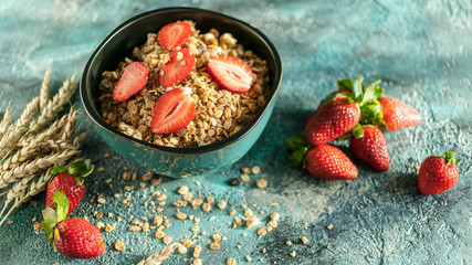 Food banner. Homemade Granola. Baked muesli and fresh strawberries. Delicious and healthy breakfast. Selective focus