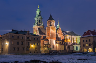 Fototapeta na wymiar Wawel cathedral illuminated at winter night, Krakow, Poland