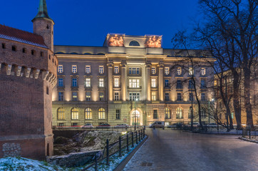 Krakow, Poland, old National Bank of Poland building on Basztowa street in the night