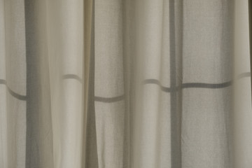 Cloth curtain with shades in an american home