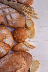 Freshly Baked Homemade Bread, close-up, isolated on a white background.
