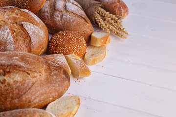 Freshly Baked Homemade Bread, close-up, isolated on a white background.
