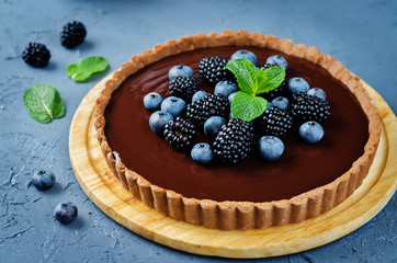 Chocolate tart with blackberries and blueberries