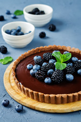 Chocolate tart with blackberries and blueberries