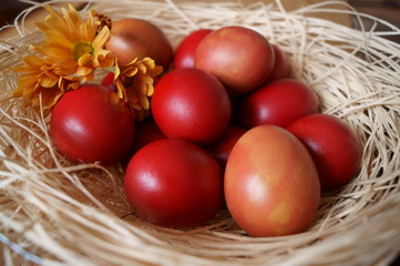 Obraz na płótnie Canvas Easter background with red eggs