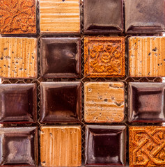 Mosaic tile background in brown-orange colors