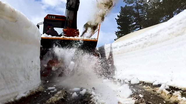 snow plow backhoe loader