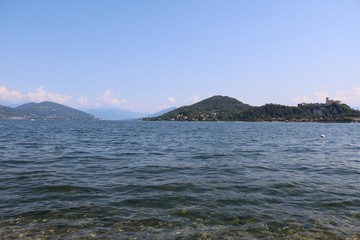 View from Arona to Rocca d'Angera in Angera at Lake Maggiore, Italy