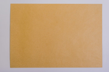 Vintage envelope blank, front side, close-up, on white background.