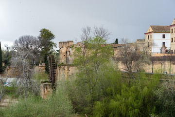 View of the old water mill near the stone bridge of Cordoba,Spain - 251082191