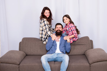 Obraz na płótnie Canvas Love Still Keeps Us Together. Happy family weekend. Little girl love her parents. Father, mother and child at home on weekend. Family day. Bearded man and woman with daughter. weekend together