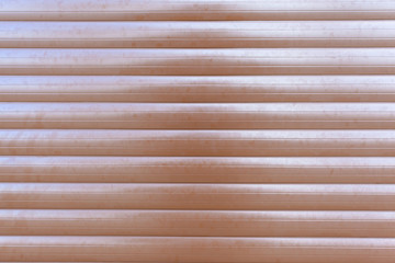 Obraz premium brown surface of closed blinds, background, texture