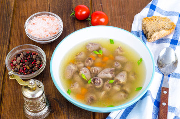 Transparent broth with chicken liver
