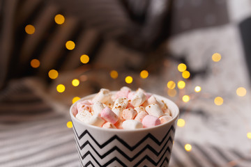 marshmallow hot drink in the cold season. home made hot chocolate with marshmallow.