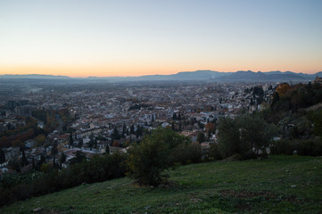 Sunset at Mirador del Barranco del Abogado Lookout with view onto Albayzin in Granada, Spain