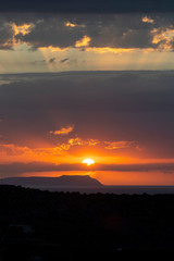 Late Sunset in Mountains Strong Orange and Purple Clouds, Silhouette Landscape