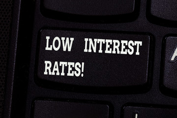 Handwriting text writing Low Interest Rates. Concept meaning meant to stimulate economic growth...