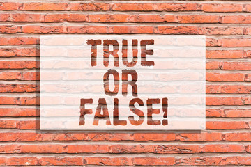 Fototapeta na wymiar Text sign showing True Or False. Conceptual photo Decide between a fact or telling a lie Doubt confusion Brick Wall art like Graffiti motivational call written on the wall