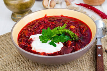 Delicious hot vegetable soup with beetroot, Russian borscht