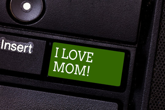 Handwriting text I Love Mom. Concept meaning Good feelings about my mother Affection loving happiness Keyboard key Intention to create computer message pressing keypad idea