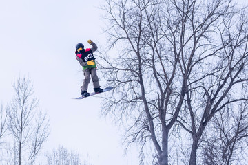 People are enjoying downhill skiing and snowboarding	